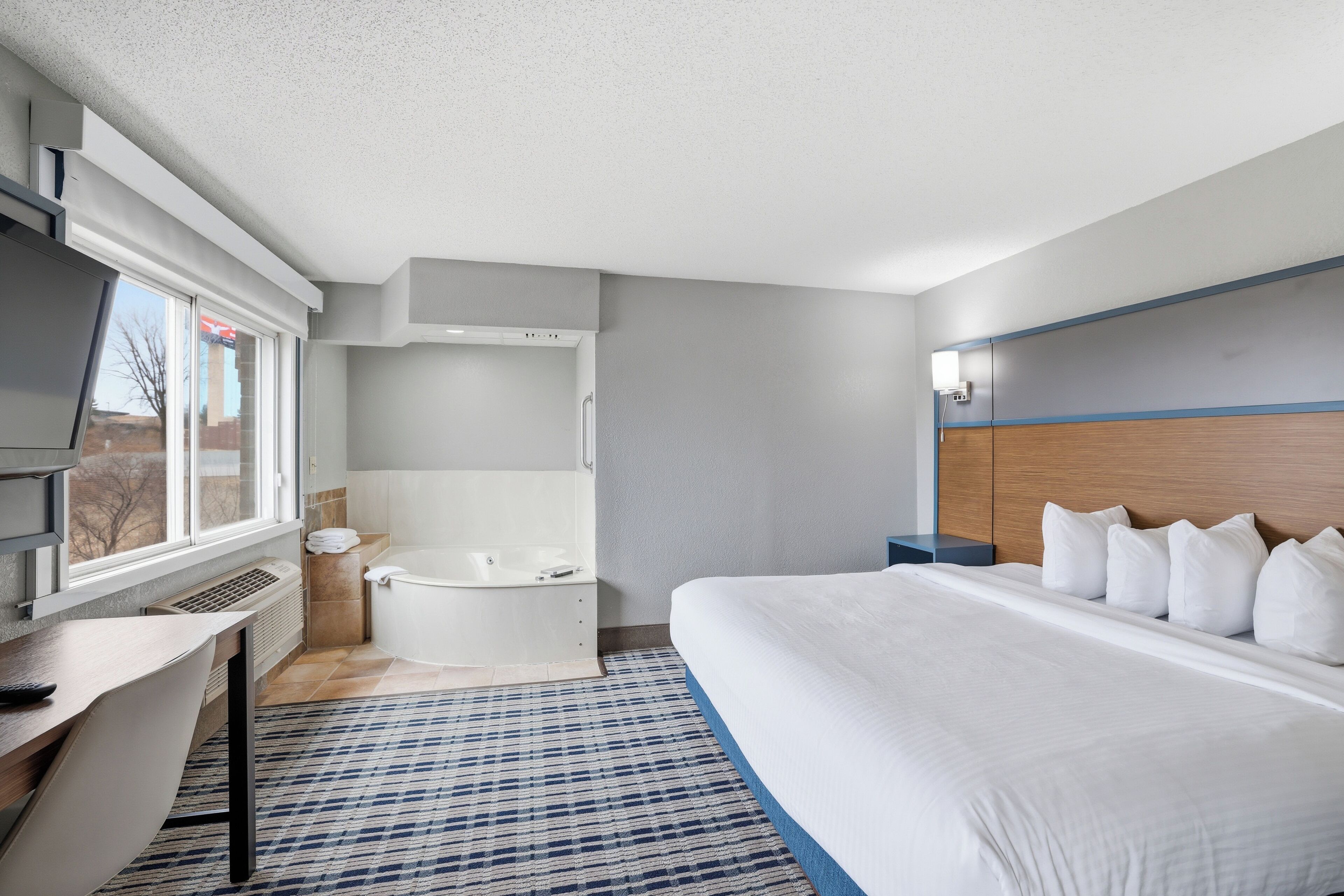 Suíte premier, 1 cama King, para não fumantes | Camas com colchões pillow-top, escrivaninha