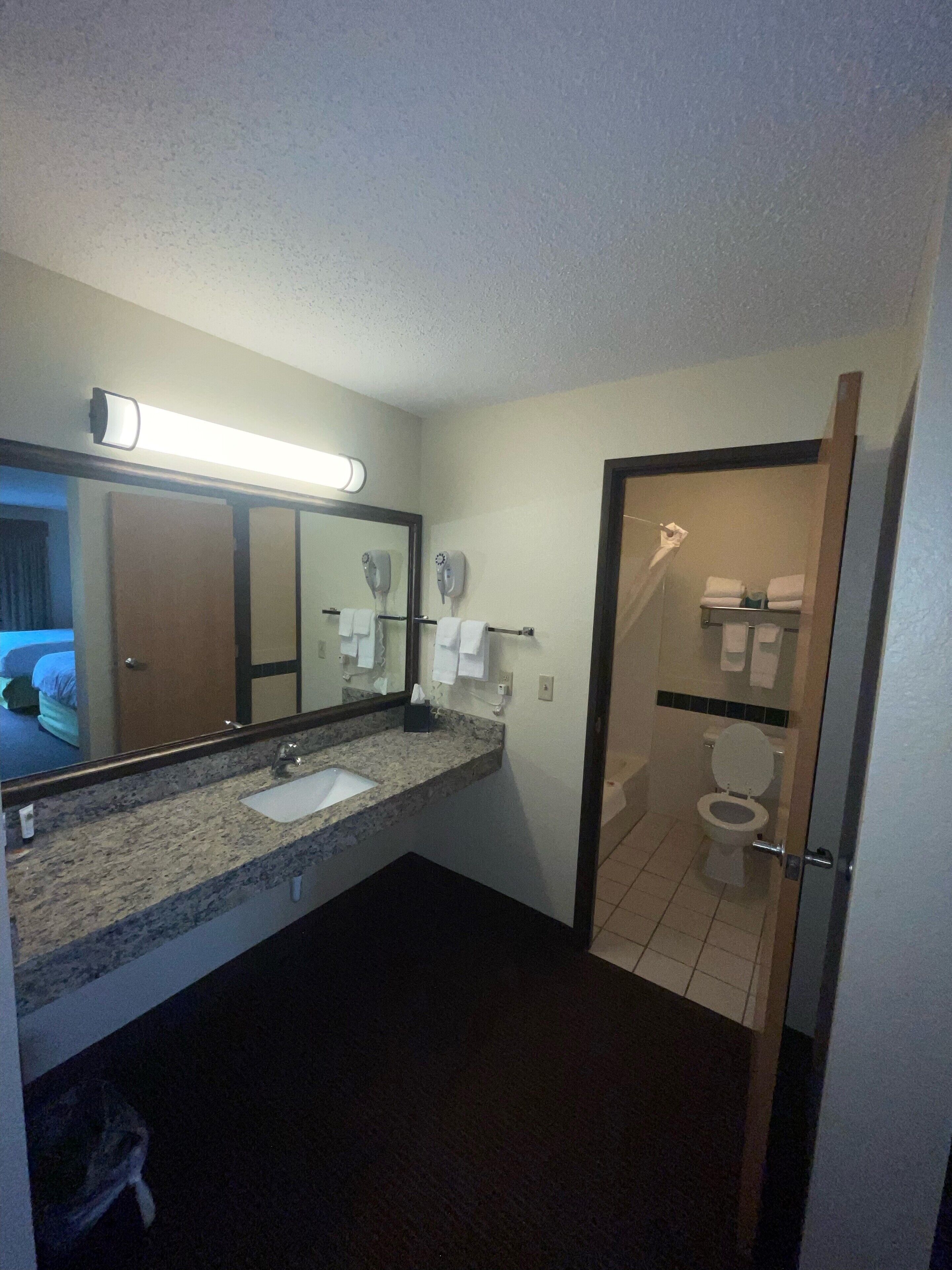 suite, multiple beds | bathroom | free toiletries, hair dryer, towels