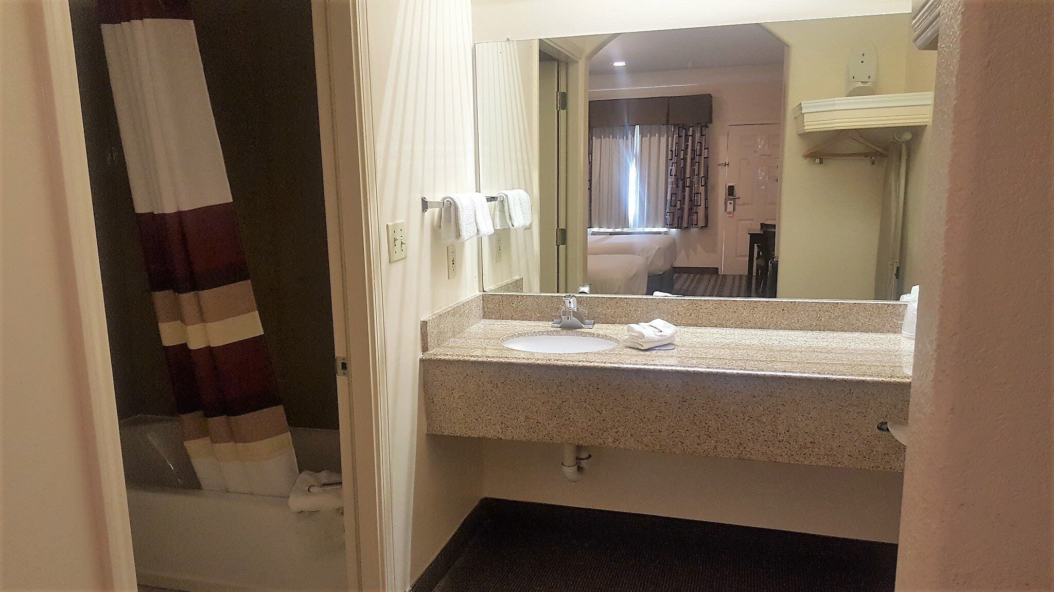 Superior Room, 1 King Bed, Non Smoking | Bathroom | Combined shower/tub, free toiletries, hair dryer, towels