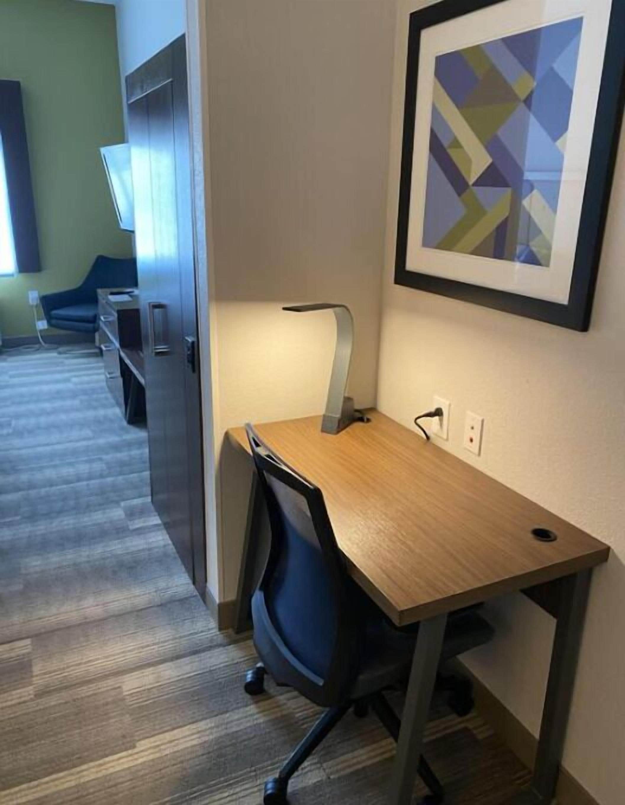 premium bedding, pillow-top beds, desk, laptop workspace