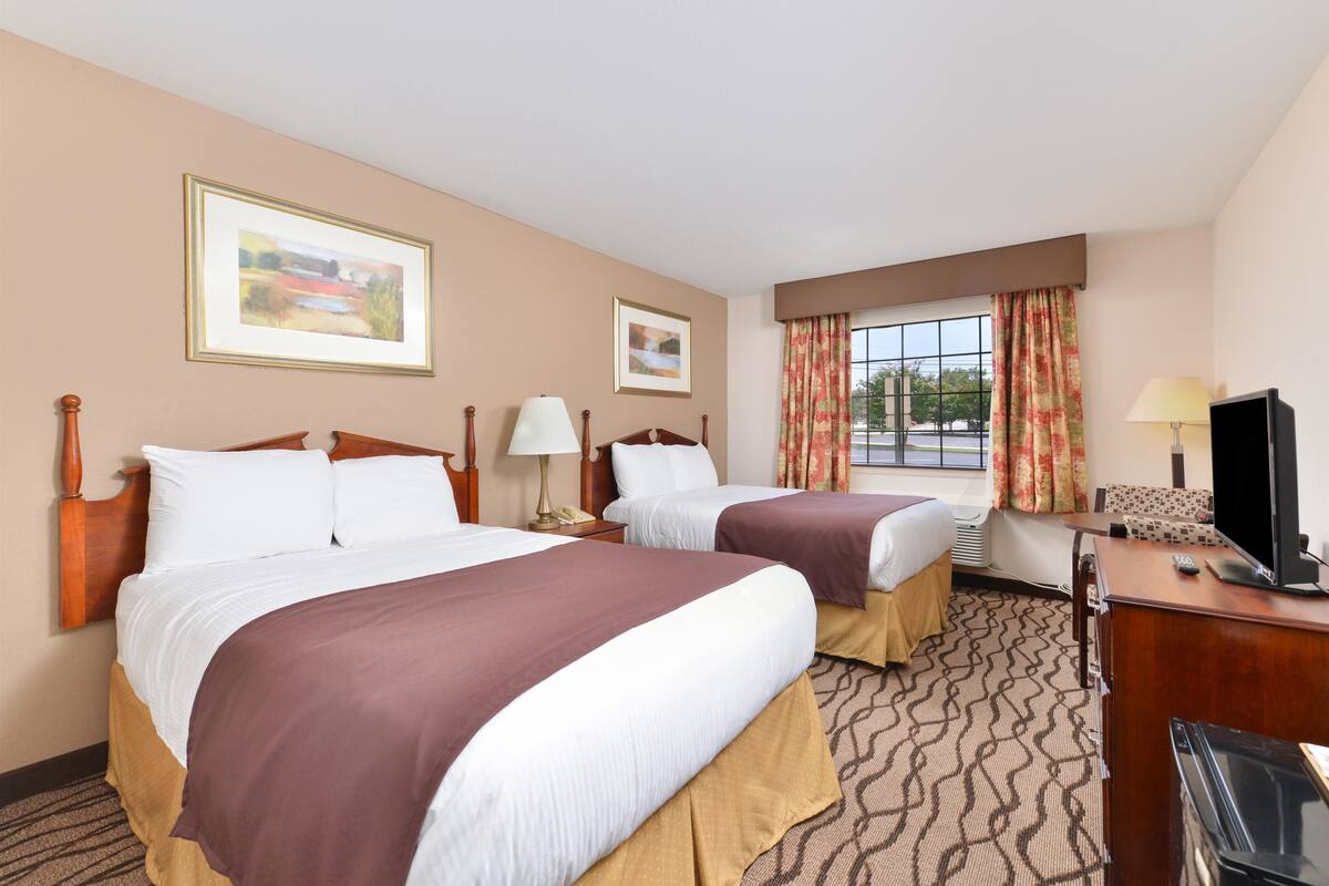 Desk, iron/ironing board, WiFi (free), alarm clocks