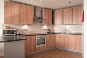 Apartment, 1 Schlafzimmer | Eigene Küche | Großer Kühlschrank, Mikrowelle, Ofen, Herdplatte