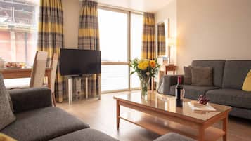 Apartment, 2 Bedrooms | Living area | Flat-screen TV