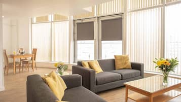 Apartment, 2 Bedrooms | Living area | Flat-screen TV