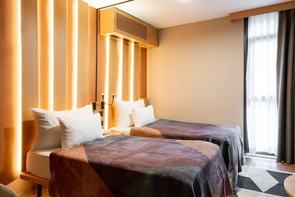 Literie de qualité supérieure, mini-bar avec articles gratuits