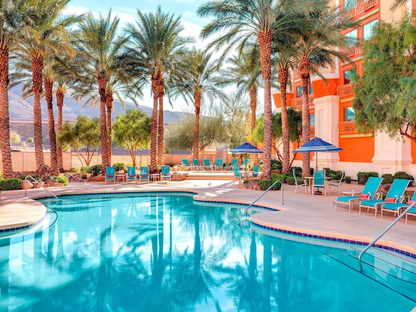 Outdoor pool, open 9 AM to 9 PM, pool loungers