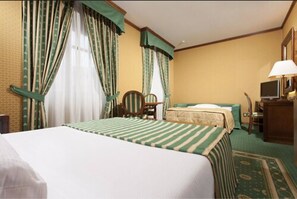 Premium bedding, minibar, in-room safe, desk