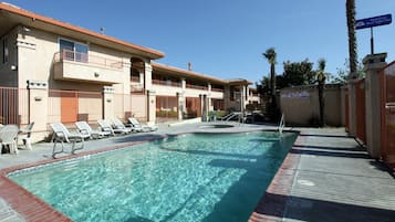 Outdoor pool, pool umbrellas, sun loungers