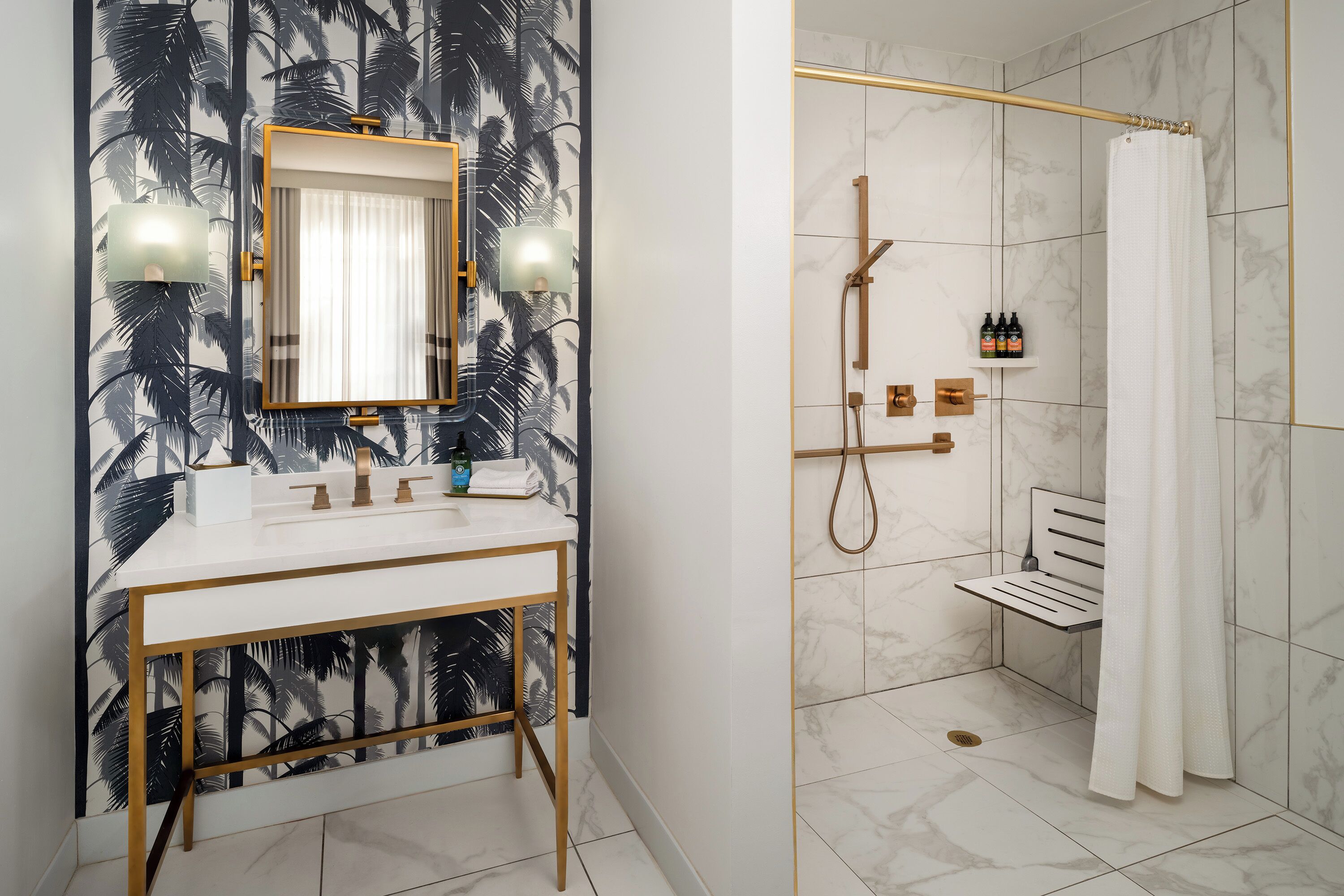 combined shower/bathtub, designer toiletries, hair dryer, towels