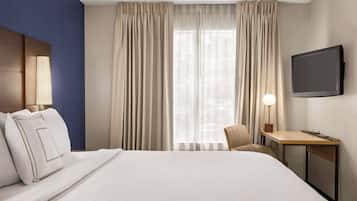 Roba de llit d'alta qualitat, escriptori i planxa i posts de planxar