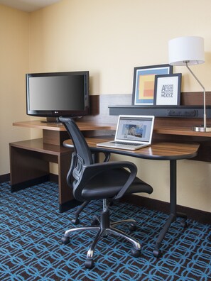Premium bedding, down comforters, pillowtop beds, desk