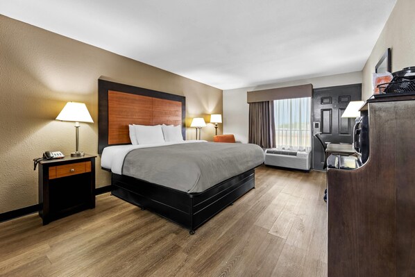 Habitación estándar, 1 cama King size, para no fumadores | Tabla de planchar con plancha, wifi gratis y ropa de cama 