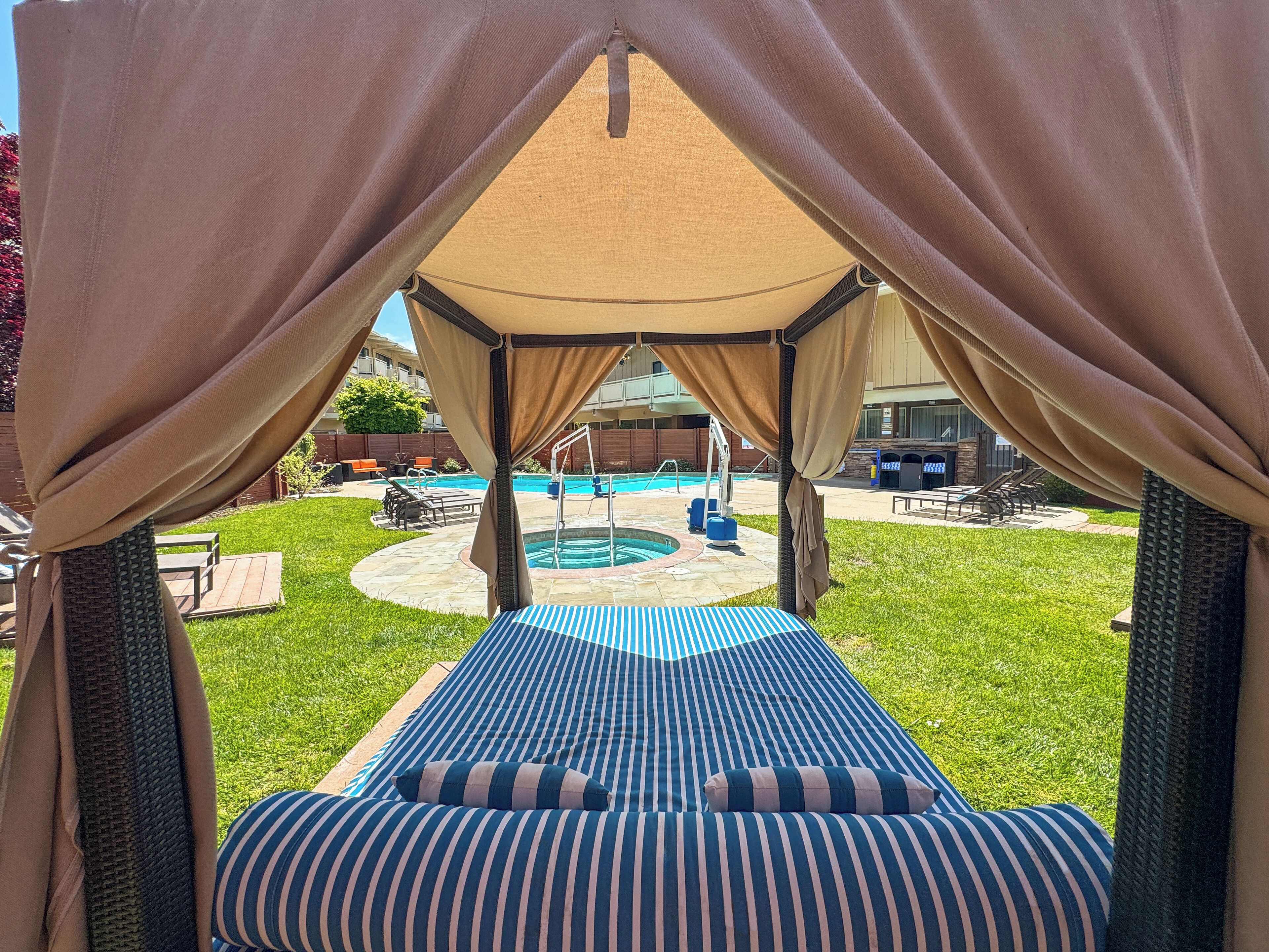 Seasonal outdoor pool, free pool cabanas, pool umbrellas