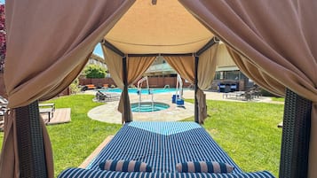 Seasonal outdoor pool, free pool cabanas, pool umbrellas