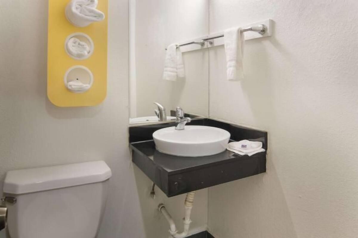 Combined shower/tub, hair dryer, towels, soap