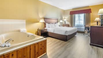 Room, 1 King Bed, Non Smoking, Jetted Tub | Iron/ironing board, free WiFi, bed sheets, alarm clocks