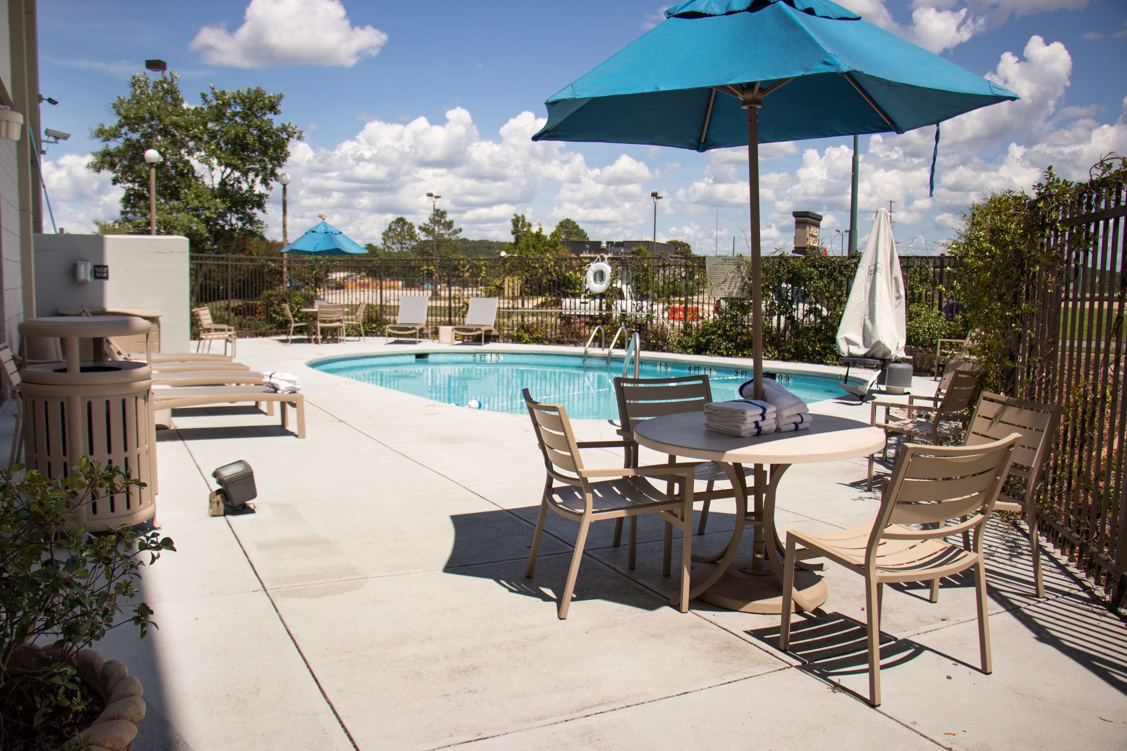 seasonal outdoor pool, pool umbrellas