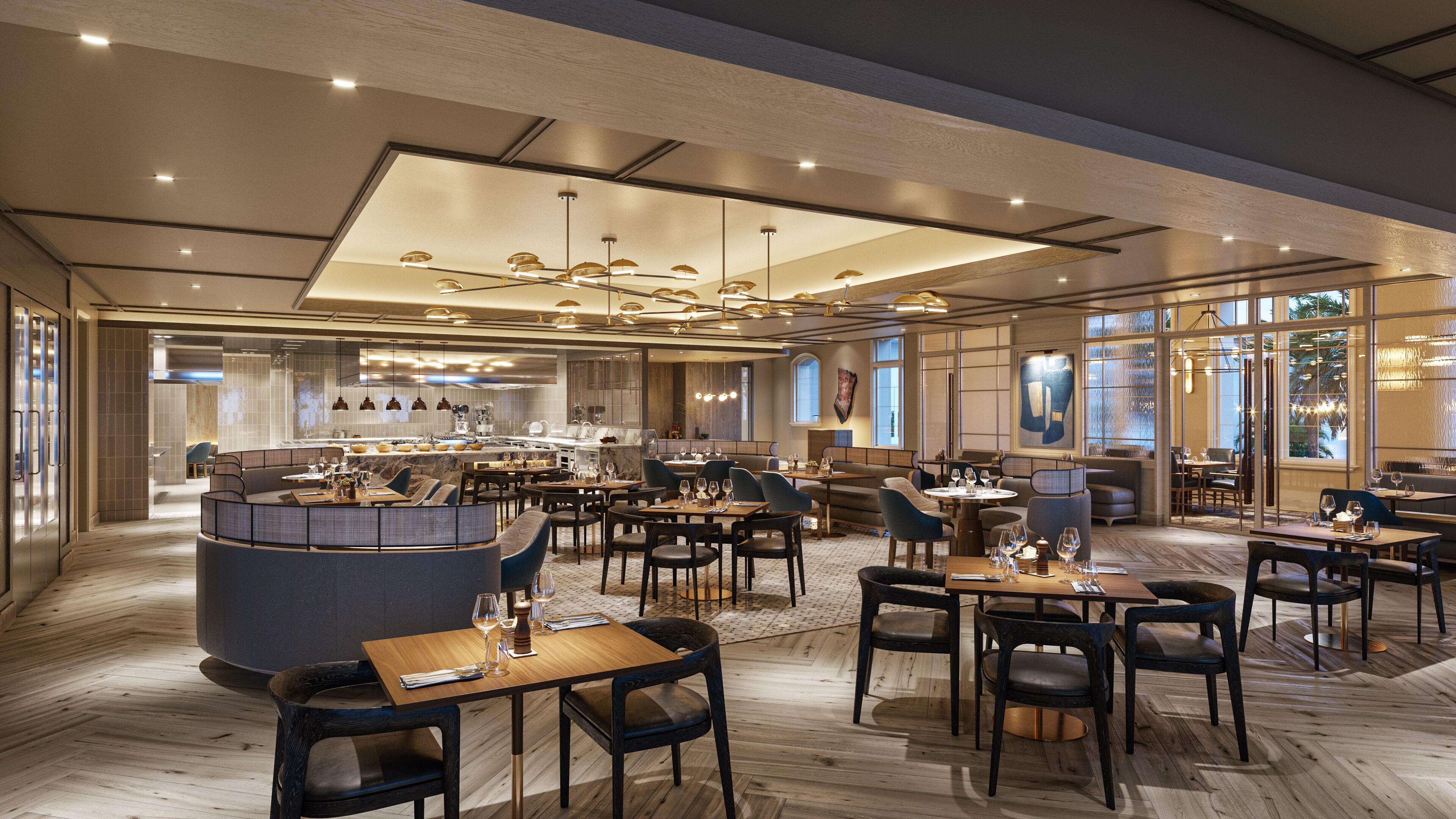 A spacious hotel lobby with multiple seating areas, a central bar, and large windows offering views.