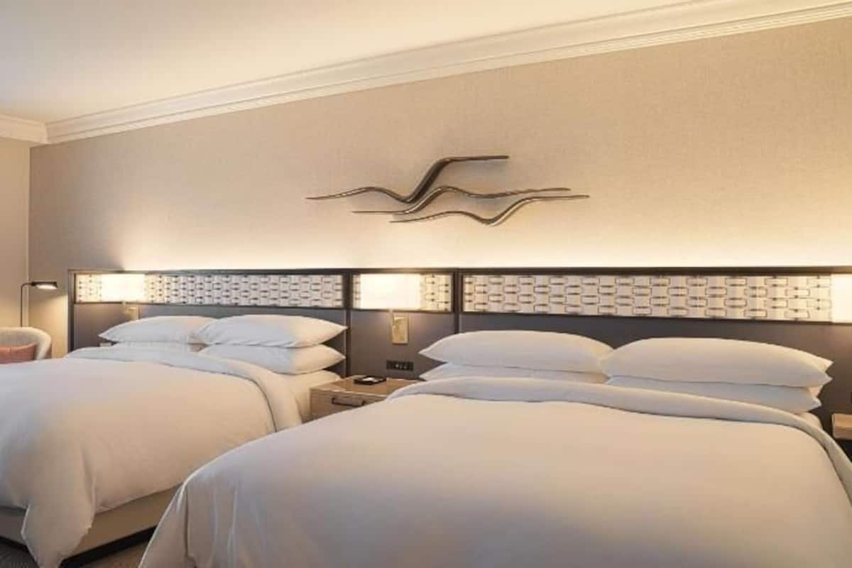 Premium bedding, down comforters, pillowtop beds, in-room safe