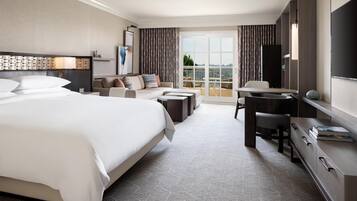 Premium bedding, down comforters, pillowtop beds, in-room safe