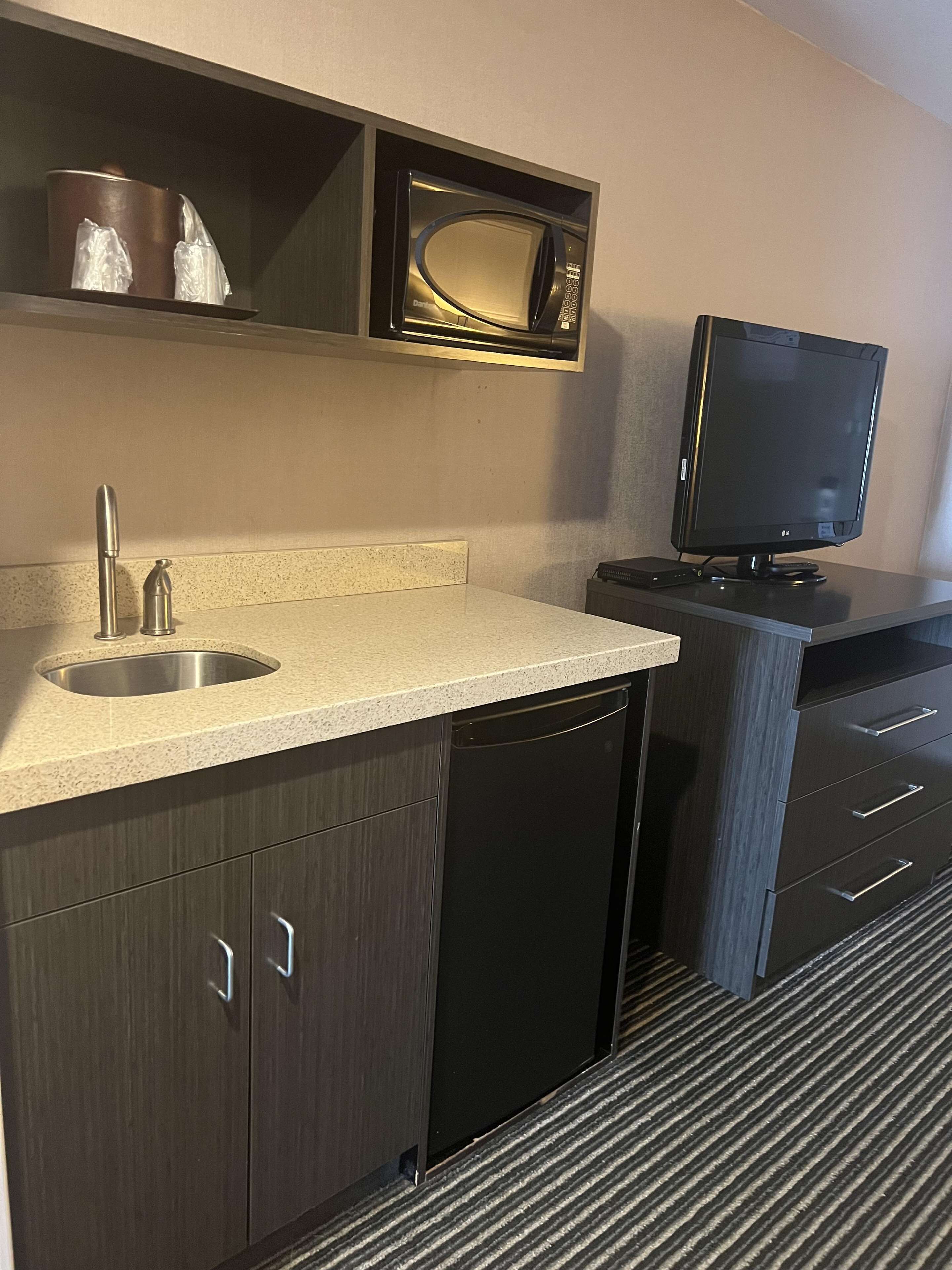 premium bedding, down duvets, blackout curtains, iron/ironing board