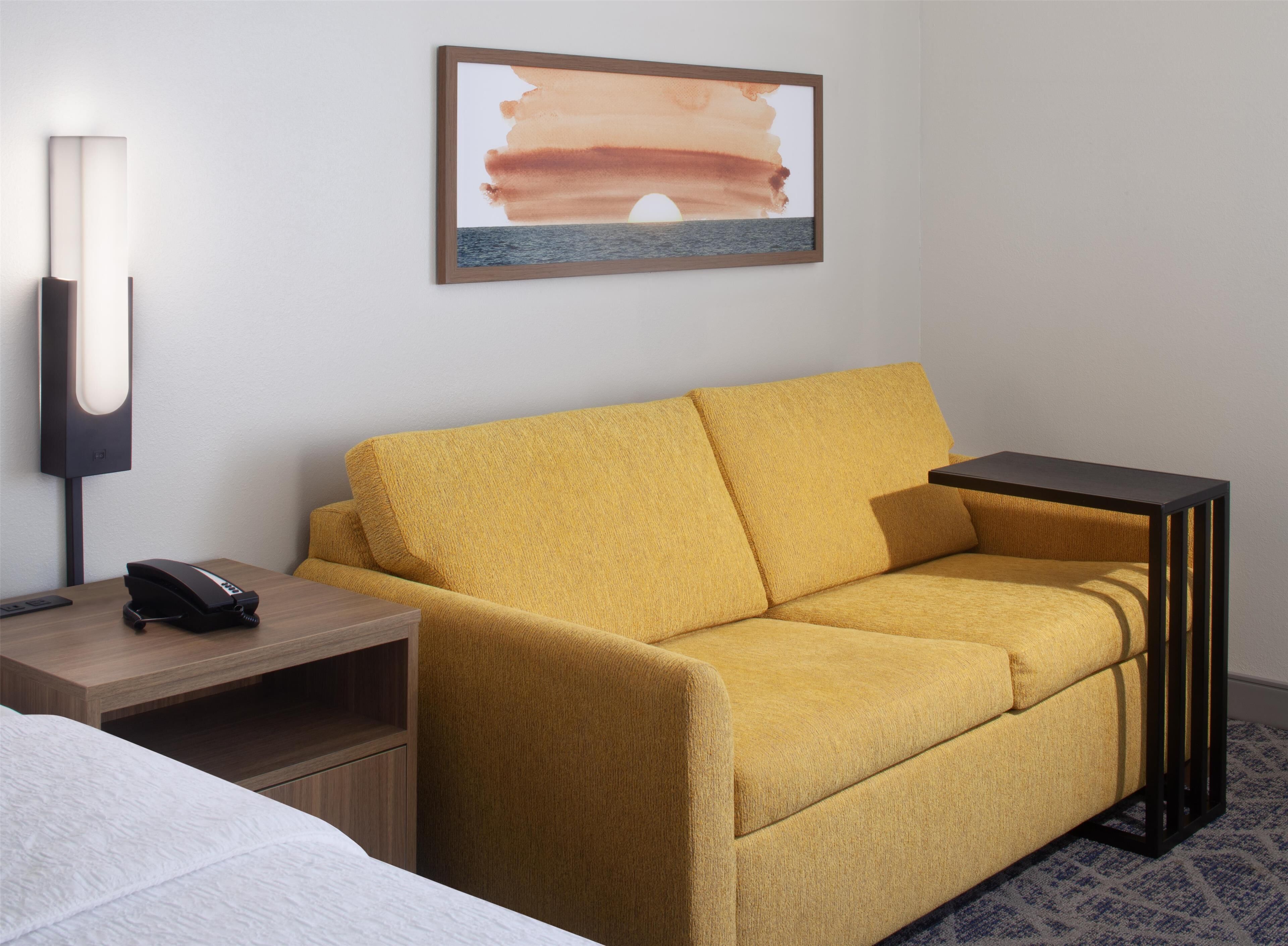 one king study sofabed non smoking | living area | 32-inch lcd tv with cable channels, tv, pay films