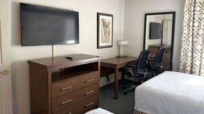 Camas con pillow-top, escritorio y espacio para trabajar con laptop 
