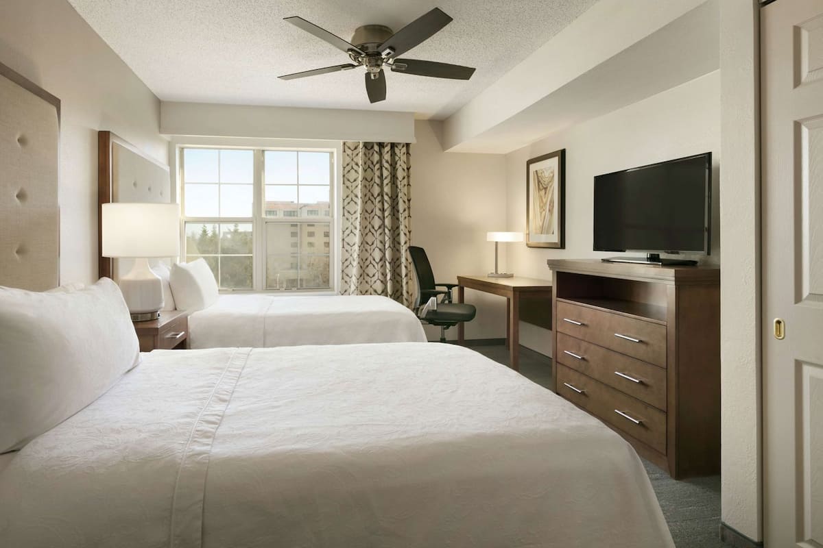Pillowtop beds, desk, laptop workspace, blackout drapes