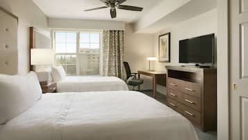 Pillow-top beds, laptop workspace, blackout curtains, iron/ironing board