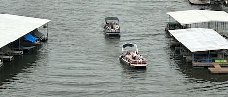 A waterway with boats and docked structures.