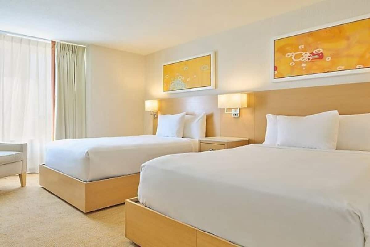 Hypo-allergenic bedding, pillowtop beds, in-room safe, desk