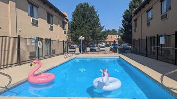 Outdoor pool, open 9:00 AM to 9:00 PM, sun loungers