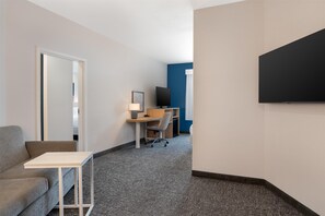 Suite, 1 Bedroom | Desk, blackout drapes, iron/ironing board, free cribs/infant beds