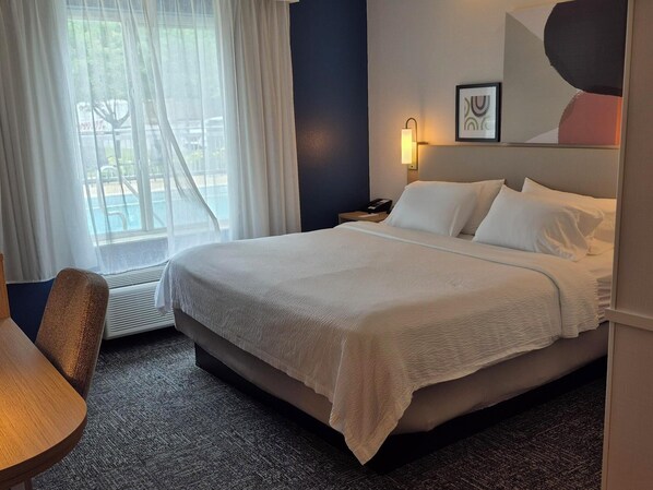 Desk, blackout drapes, iron/ironing board, free cribs/infant beds