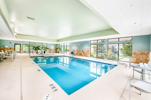 Indoor pool, open 6 AM to 11:00 PM, pool loungers