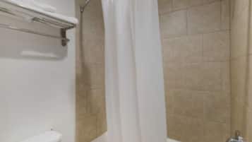 Bathtub, free toiletries, hair dryer, towels