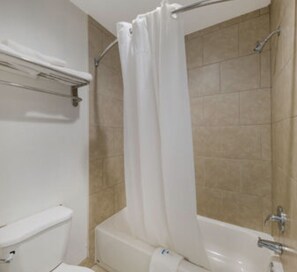 Bathtub, free toiletries, hair dryer, towels