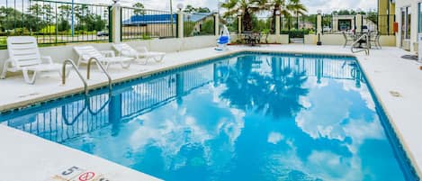 Seasonal outdoor pool, pool loungers