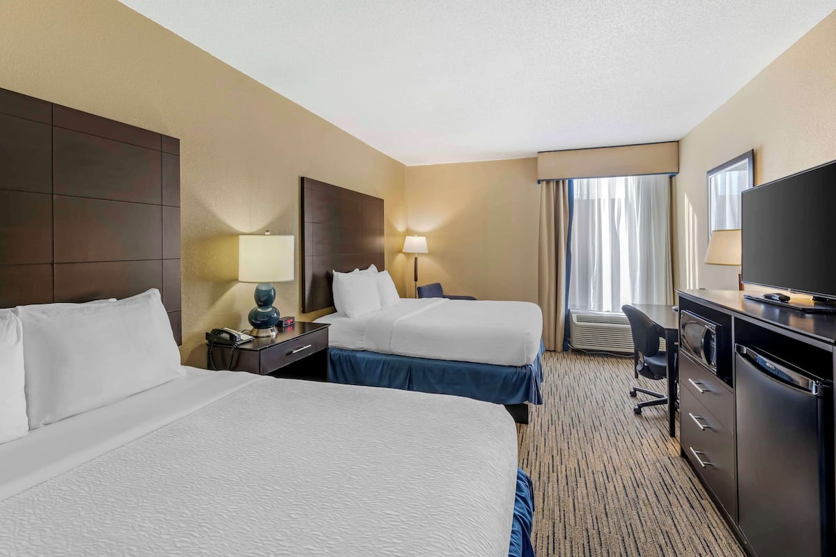 desk, laptop workspace, blackout curtains, iron/ironing board