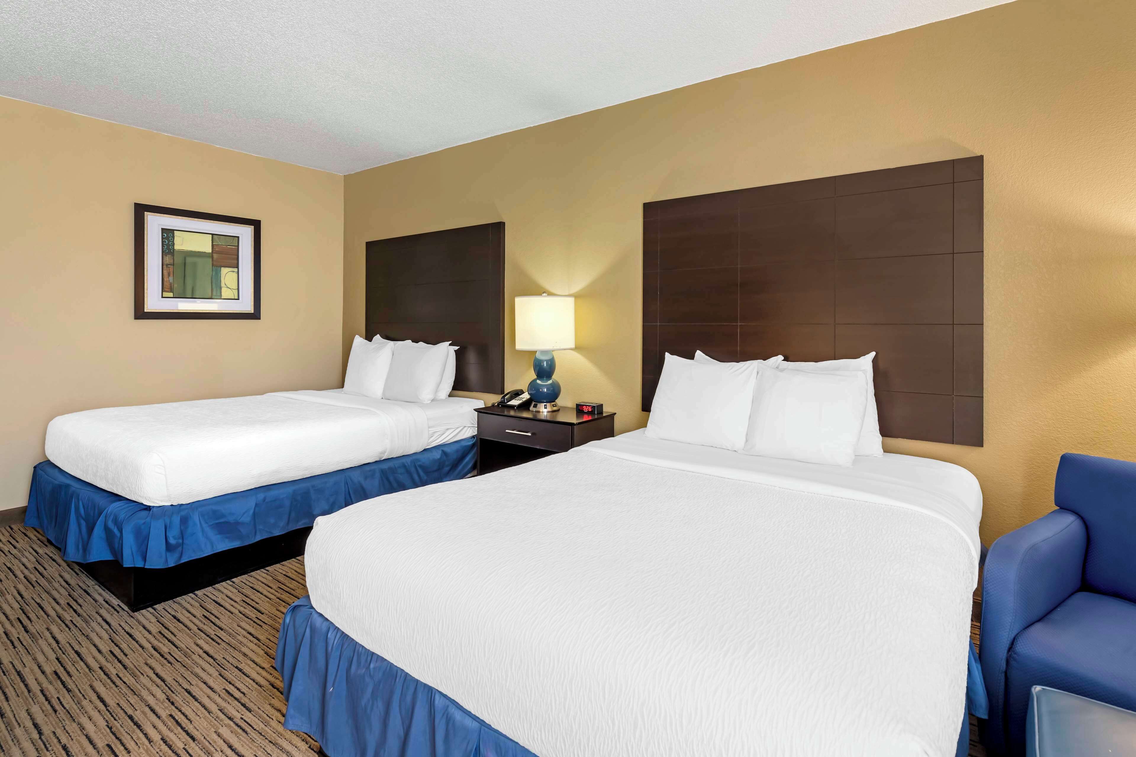 desk, laptop workspace, blackout curtains, iron/ironing board