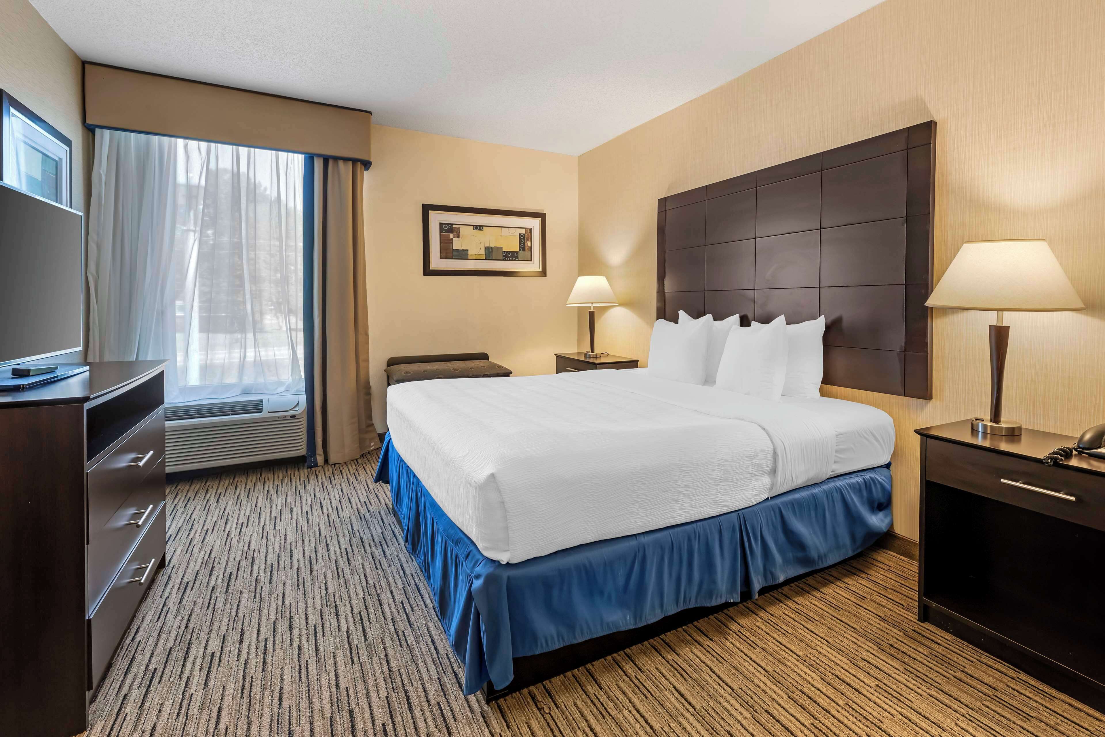 suite, 1 king bed, non smoking, kitchenette (with sofabed) | desk, laptop workspace, blackout curtains, iron/ironing board