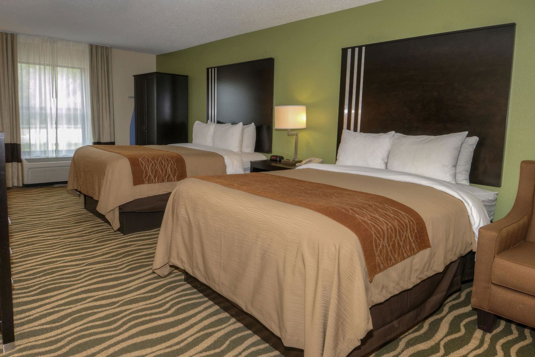 Premium bedding, pillowtop beds, desk, laptop workspace