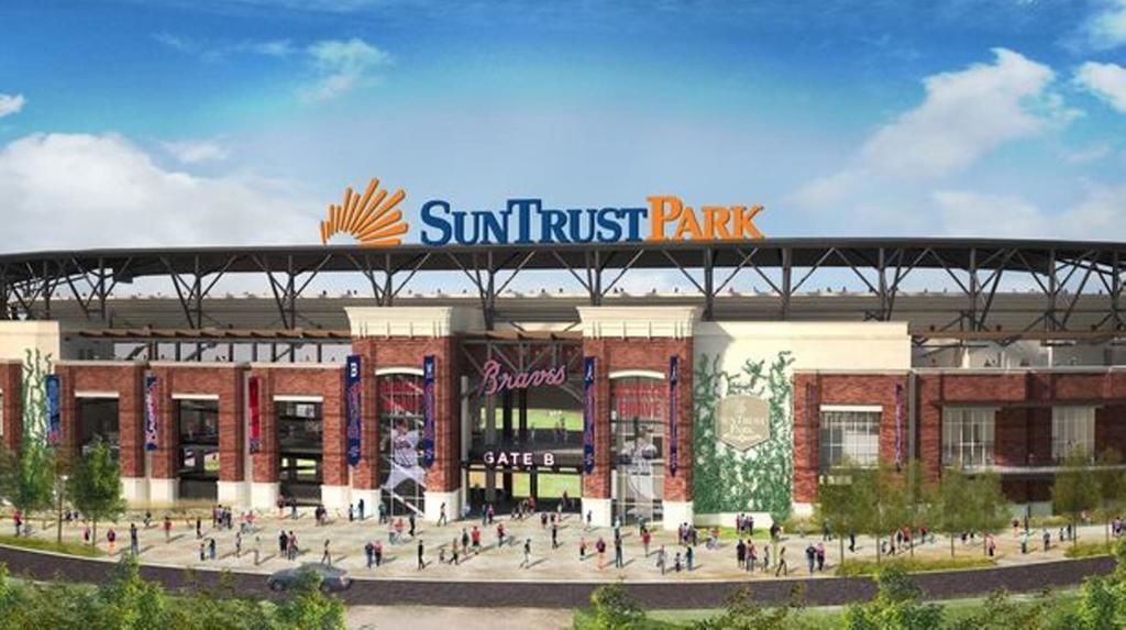 Estadi amb un cartelló gran que diu "SunTrust Park" i "Braves" a l'entrada.