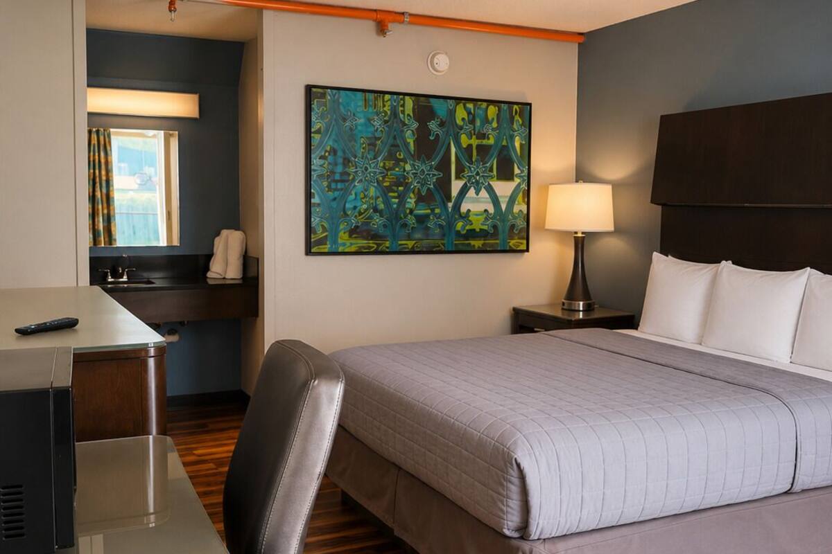 Quarto, 1 cama King, para não fumantes | Escrivaninha, Wi-Fi de cortesia, roupa de cama
