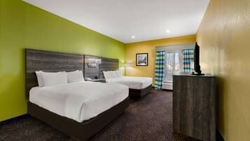 Desk, laptop workspace, iron/ironing board, free cribs/infant beds