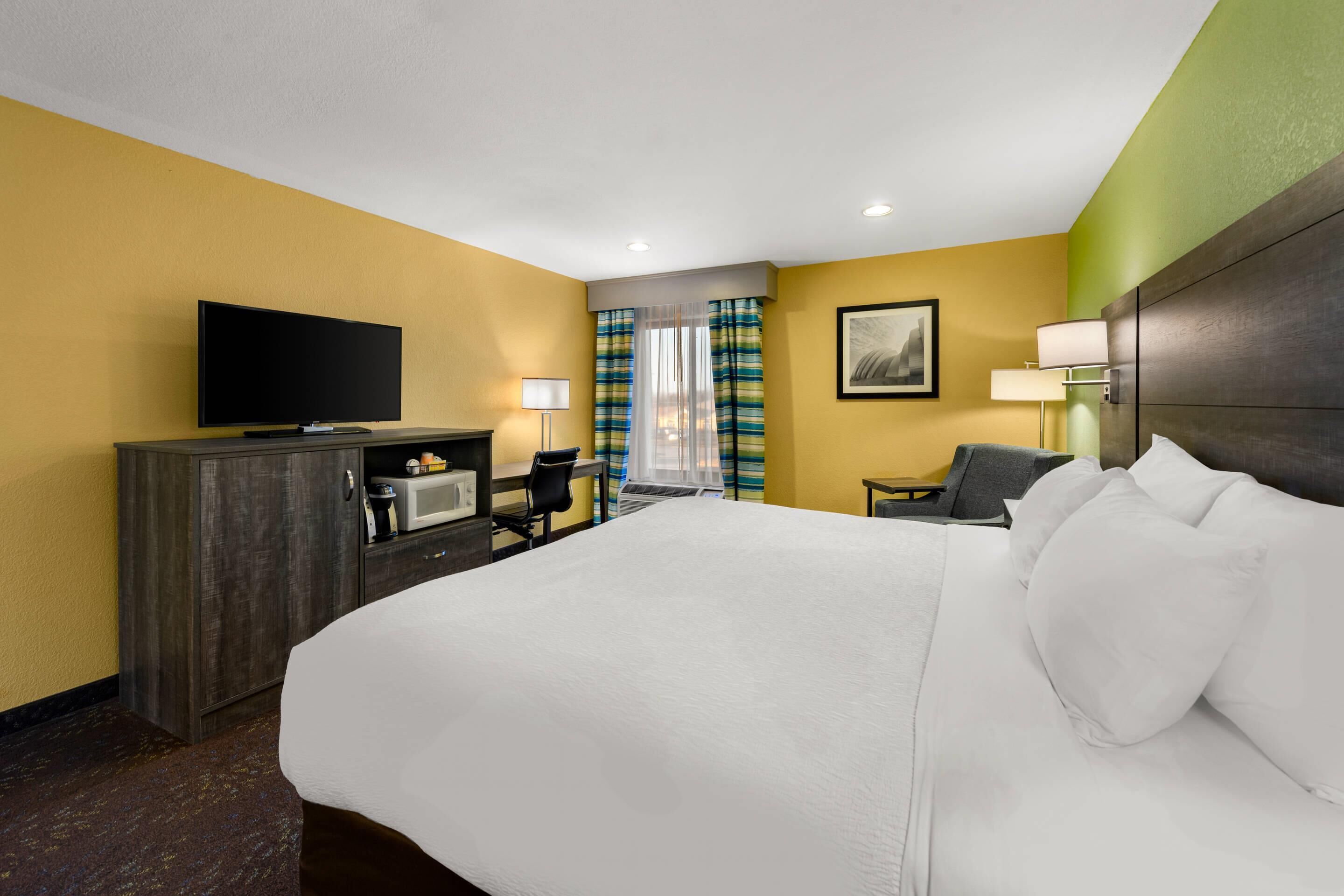 desk, laptop workspace, iron/ironing board, free cots/infant beds