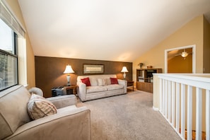 Deluxe Condo, 4 Bedrooms | Living area | TV, DVD player