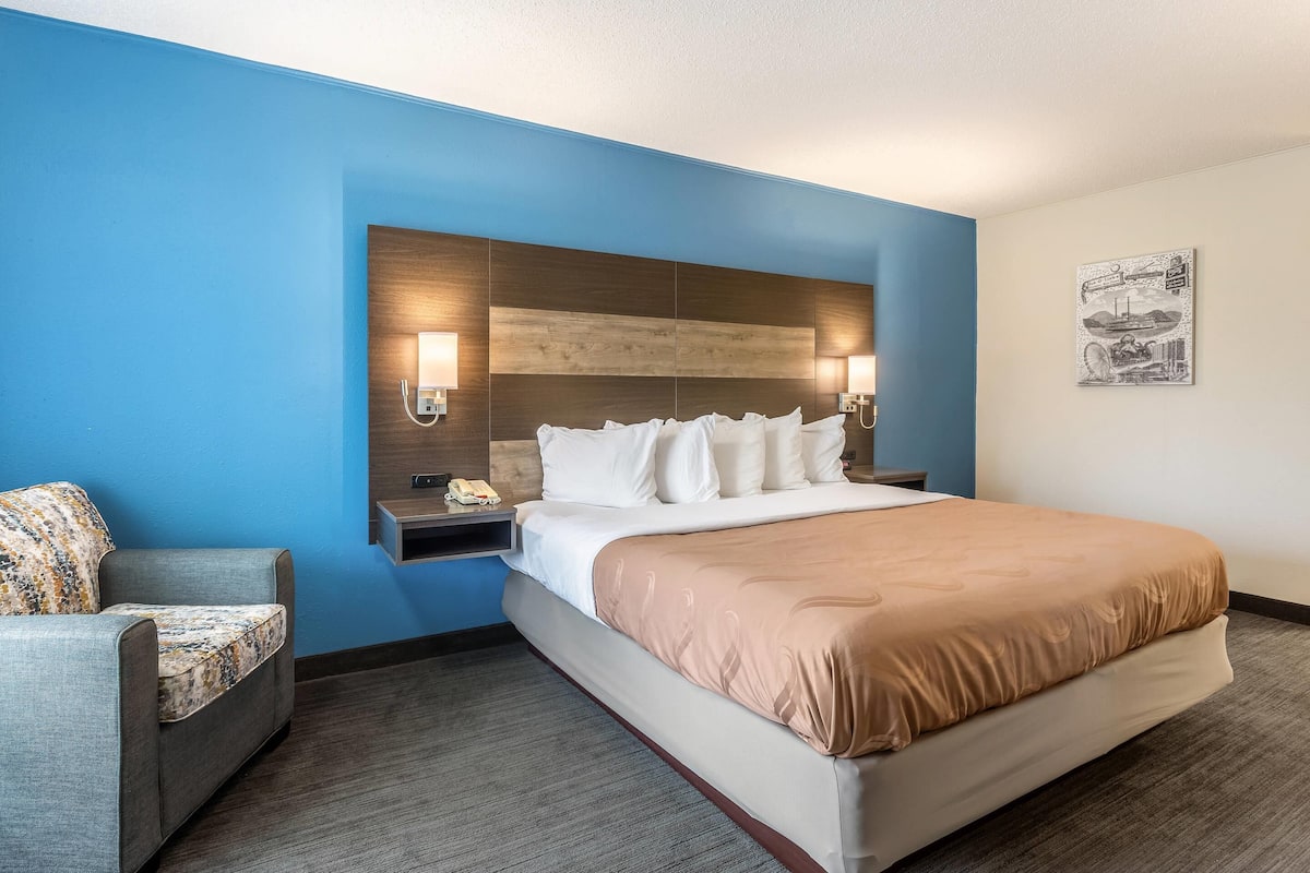 Down comforters, desk, blackout drapes, iron/ironing board