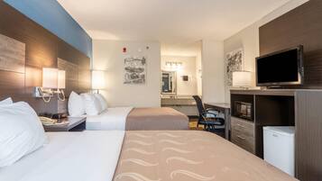 Down comforters, desk, blackout drapes, iron/ironing board