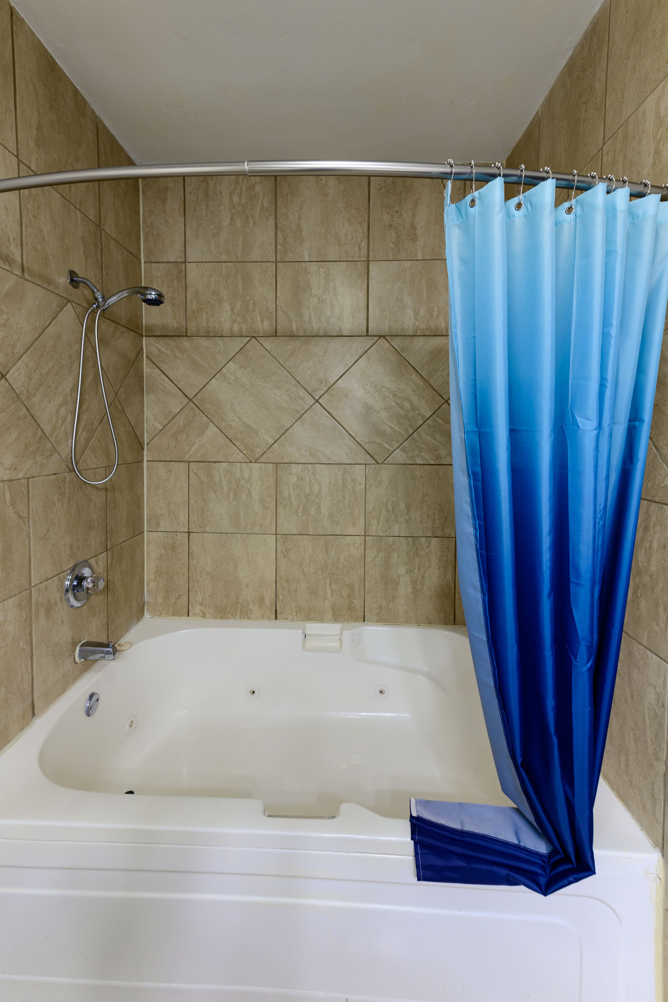 deluxe room, 1 king bed, non smoking, jetted tub | jetted bathtub